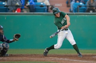 Shortstop Austin Braff lines a fastball up the middle for a single in the first inning of Paly's CCS semifinal loss against Valley Christian High School.